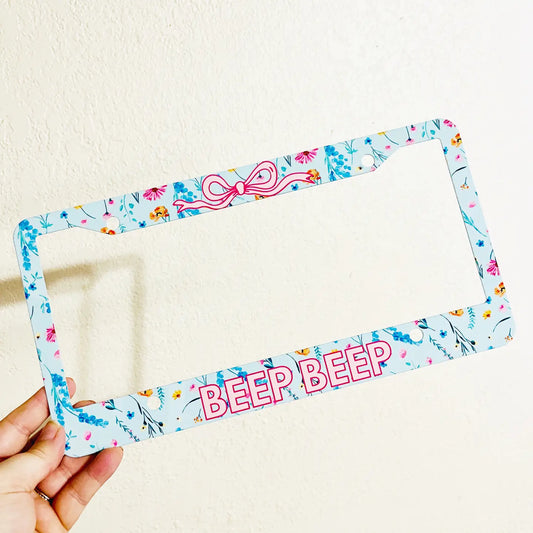 Coquette Bow and Wildflowers Beep Beep License Plate Frame